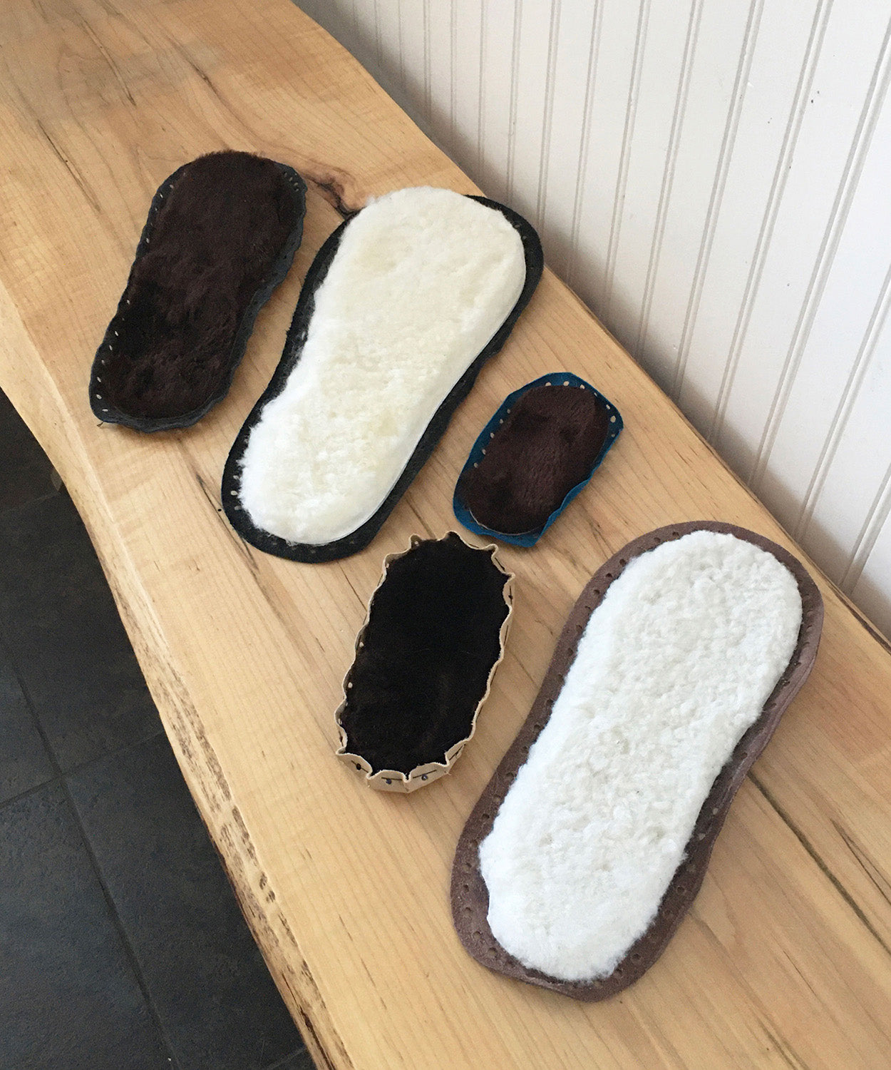 cozy shearling lining in our muffle up slippers made with leather sole and fur lining