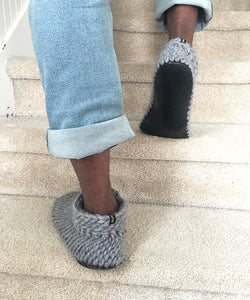 solid light gray slippers for men hand made with soft non itch merino wool. slippers with a leather sole and fur lining for men. Gray adult Padraig slippers. Slipper booties for men, gray knitted home shoes men wide fit. best slipper booties for men