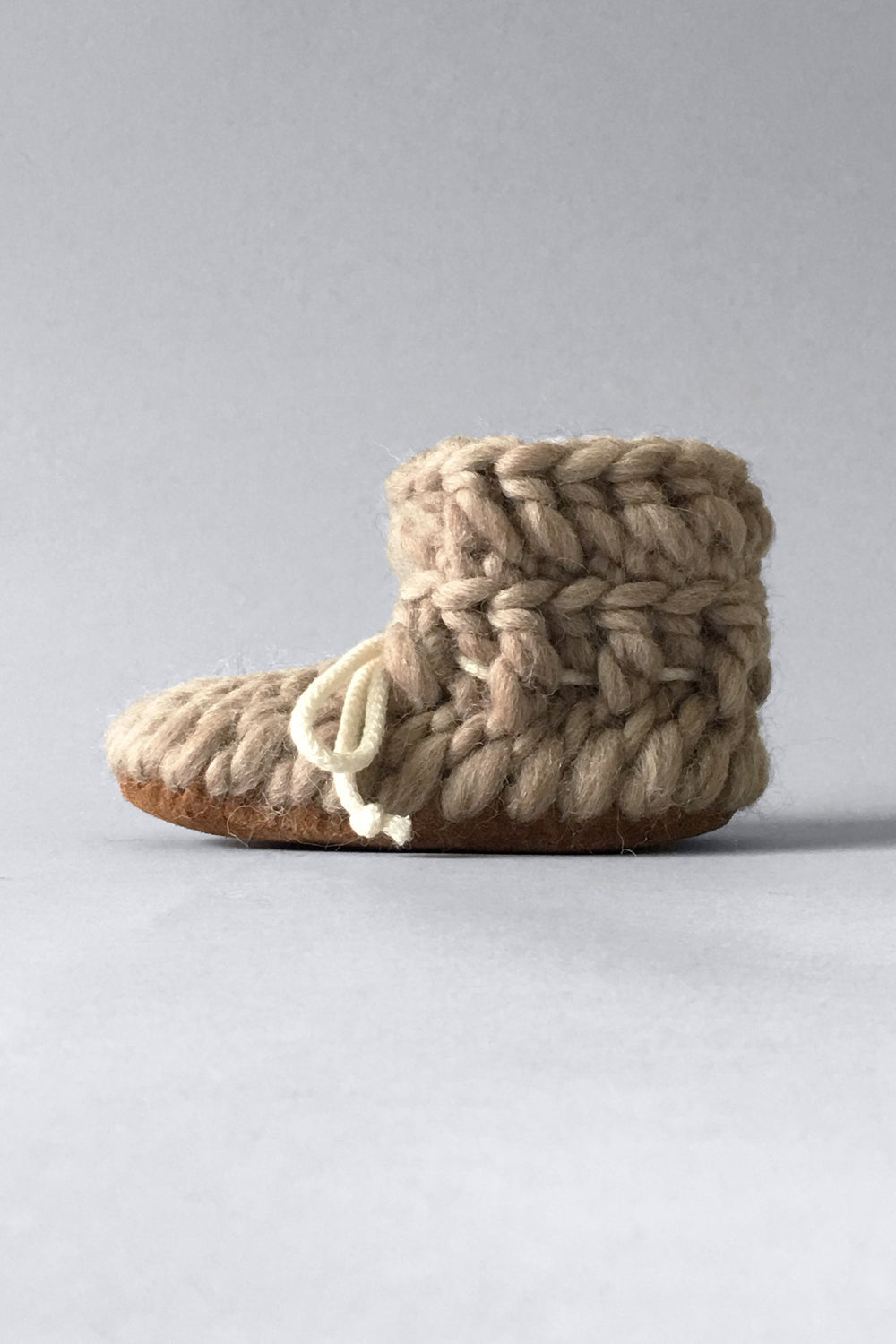 Crochet beige wool baby shoes with leather soles, handmade in Canada