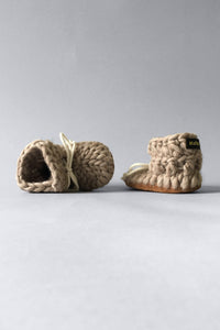 knit slipper boots for baby with shoe lace, handmade in canada with merino wool in taupe for eco friendly baby